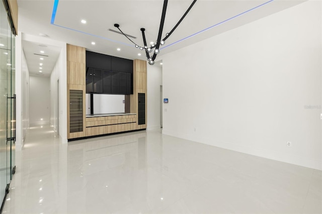 1108 SW 24th St, Cape Coral, FL 33991 - unfurnished living room with recessed lighting and light tile patterned floors