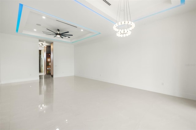 1108 SW 24th St, Cape Coral, FL 33991 - unfurnished room with a raised ceiling, a chandelier, baseboards, tile patterned flooring, and recessed lighting