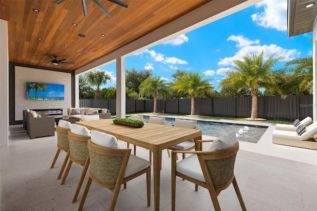 1108 SW 24th St, Cape Coral, FL 33991 - fenced backyard with ceiling fan, outdoor lounge area, and a patio area