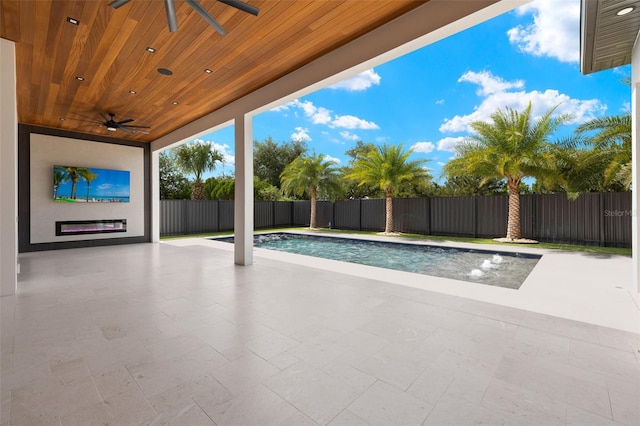 1108 SW 24th St, Cape Coral, FL 33991 - view of pool featuring a ceiling fan and a patio