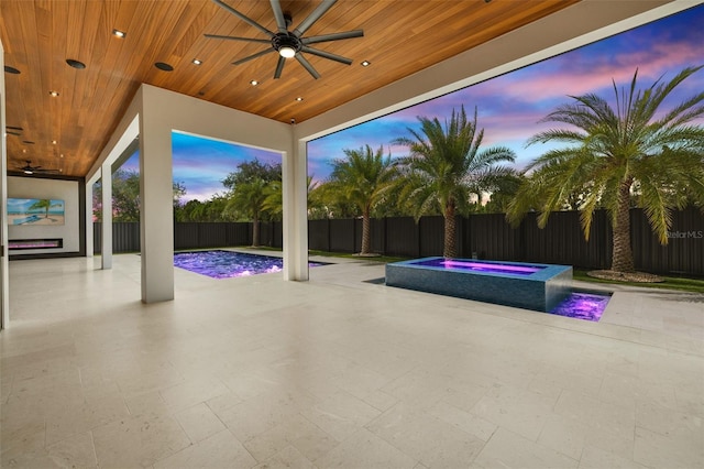 1108 SW 24th St, Cape Coral, FL 33991 - view of pool with a ceiling fan, a patio, a fenced backyard, and a pool with connected hot tub