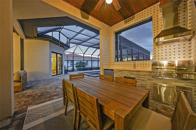 1801 Los Alamos Dr, Punta Gorda, FL 33950 - view of patio / terrace featuring area for grilling, a ceiling fan, outdoor dining space, and glass enclosure