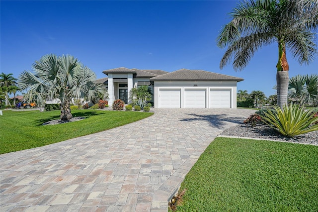 1801 Los Alamos Dr, Punta Gorda, FL 33950 - view of front of property with decorative driveway, an attached garage, a front lawn, and stucco siding