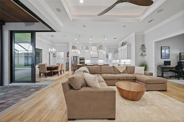 1801 Los Alamos Dr, Punta Gorda, FL 33950 - living area with light wood finished floors, a raised ceiling, a ceiling fan, a desk, and recessed lighting