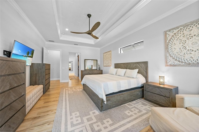 1801 Los Alamos Dr, Punta Gorda, FL 33950 - bedroom featuring light wood-style flooring, a tray ceiling, crown molding, ceiling fan, and recessed lighting
