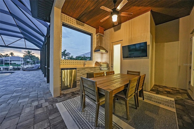 1801 Los Alamos Dr, Punta Gorda, FL 33950 - view of patio with area for grilling, ceiling fan, glass enclosure, outdoor dining area, and boat lift