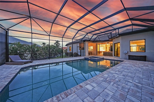 1801 Los Alamos Dr, Punta Gorda, FL 33950 - view of swimming pool with a patio area, a pool with connected hot tub, and glass enclosure
