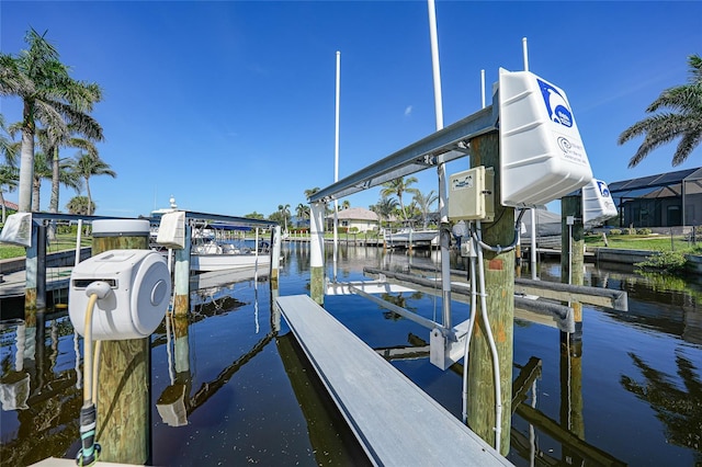 1801 Los Alamos Dr, Punta Gorda, FL 33950 - dock featuring boat lift and a water view