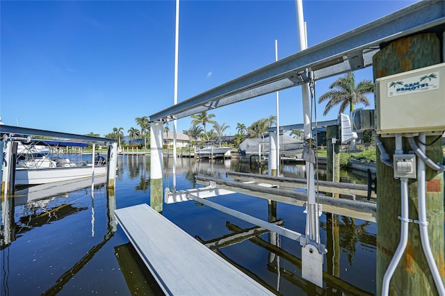 1801 Los Alamos Dr, Punta Gorda, FL 33950 - dock area featuring boat lift and a water view