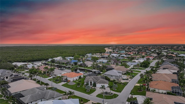 1801 Los Alamos Dr, Punta Gorda, FL 33950 - aerial view at dusk of a residential view and a water view