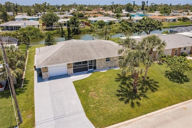 444 Edgewood Rd, Venice, FL 34293 - aerial perspective of suburban area featuring a large body of water