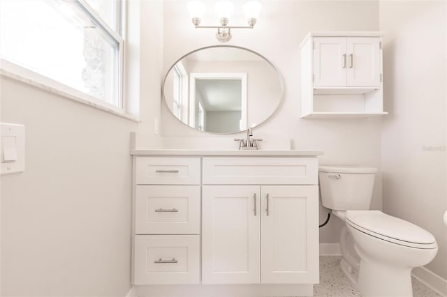 444 Edgewood Rd, Venice, FL 34293 - half bath featuring vanity and speckled floor