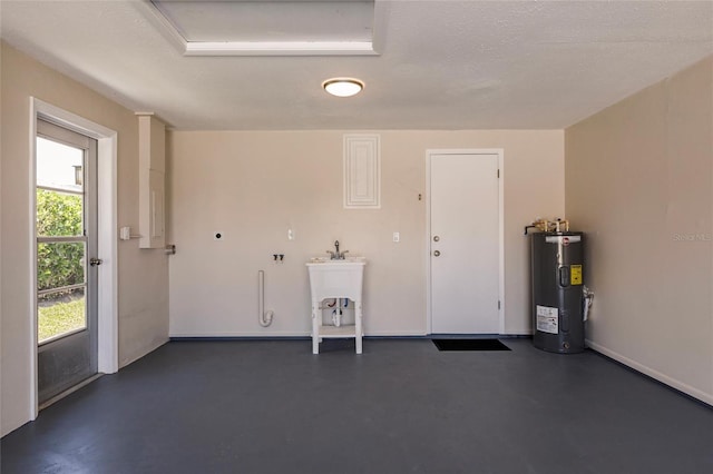 444 Edgewood Rd, Venice, FL 34293 - garage with water heater and a sink