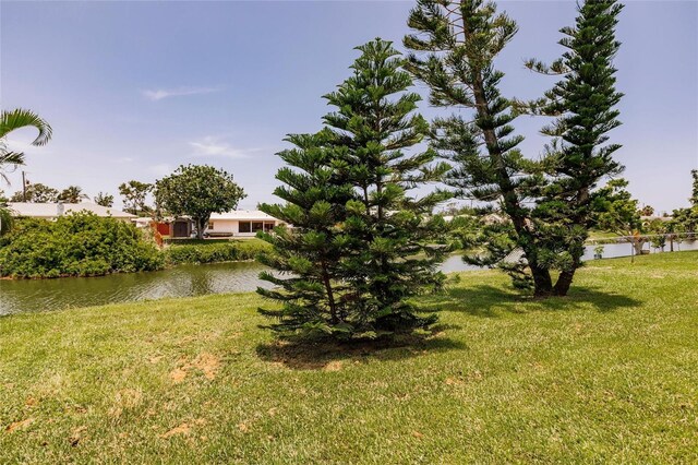 444 Edgewood Rd, Venice, FL 34293 - view of grassy yard with a water view