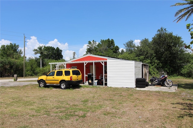 28024 Cleveland Ave, Punta Gorda, FL 33982 - view of pole building with a yard