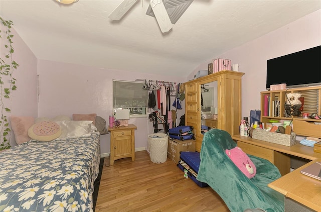 4511 Wilkinson Rd, Sarasota, FL 34233 - bedroom featuring wood finished floors, lofted ceiling, and a ceiling fan