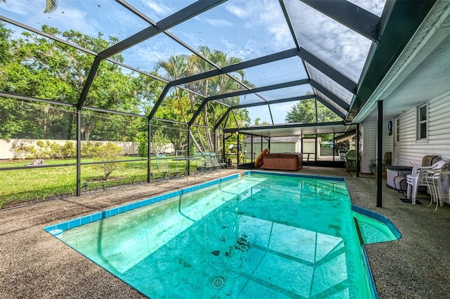 4511 Wilkinson Rd, Sarasota, FL 34233 - view of swimming pool with a hot tub, a patio area, glass enclosure, and a yard