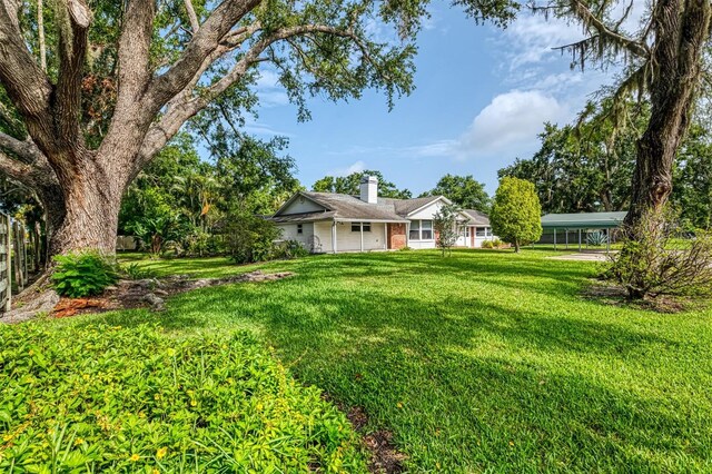 4511 Wilkinson Rd, Sarasota, FL 34233 - view of green lawn