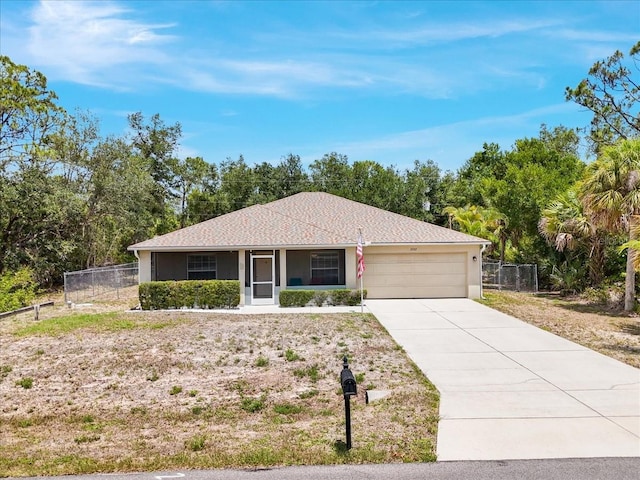 3322 Hampton St, Port Charlotte, FL 33948 - ranch-style house with a garage, concrete driveway, and view of scattered trees
