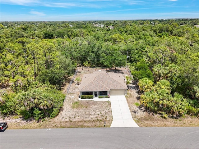 3322 Hampton St, Port Charlotte, FL 33948 - view of subject property with a forest