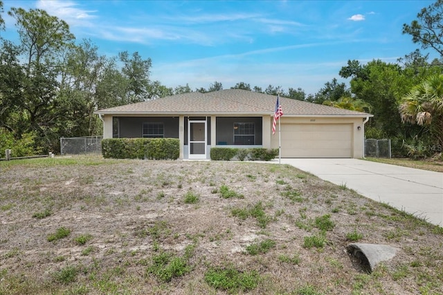 3322 Hampton St, Port Charlotte, FL 33948 - ranch-style home with an attached garage, concrete driveway, and stucco siding