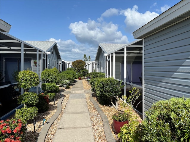 3300 Loveland Blvd Unit 602, Punta Gorda, FL 33980 - view of yard featuring a lanai