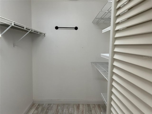 3300 Loveland Blvd Unit 602, Punta Gorda, FL 33980 - spacious closet featuring wood finished floors