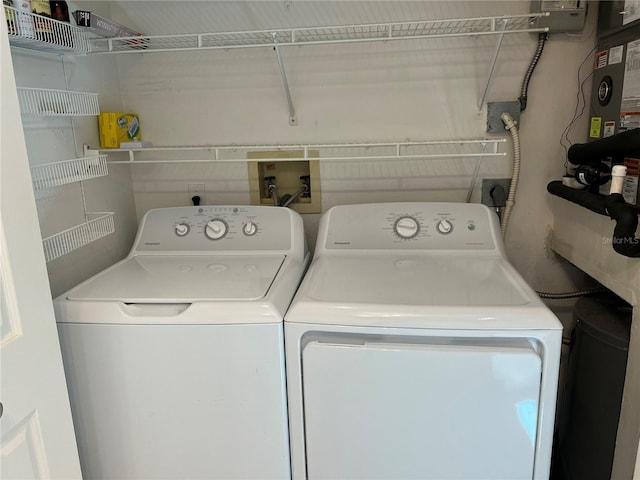 3300 Loveland Blvd Unit 602, Punta Gorda, FL 33980 - laundry room featuring washing machine and clothes dryer