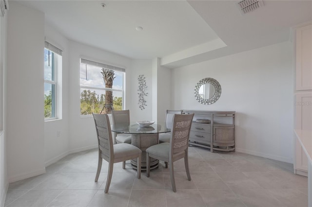 14141 Heritage Landing Blvd Unit 912, Punta Gorda, FL 33955 - dining area featuring baseboards and light tile patterned flooring