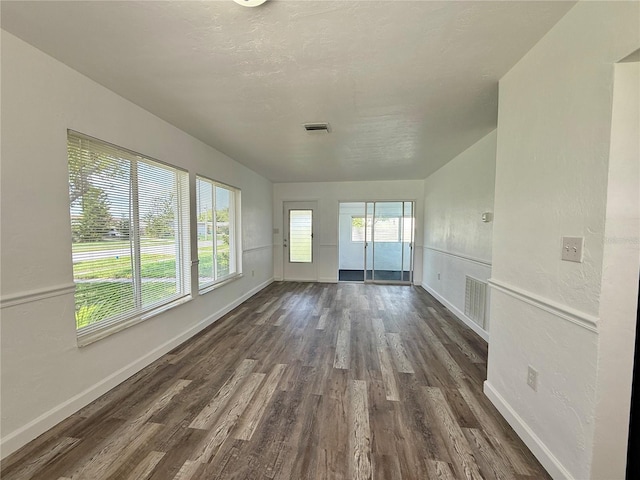 21899 Cellini Ave, Port Charlotte, FL 33952 - unfurnished room with dark wood-style flooring