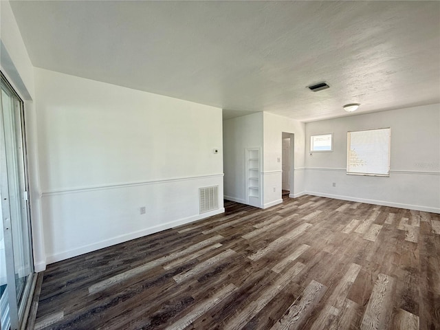 21899 Cellini Ave, Port Charlotte, FL 33952 - unfurnished room featuring dark wood-type flooring and baseboards