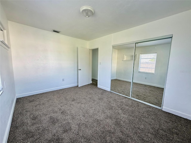 21899 Cellini Ave, Port Charlotte, FL 33952 - unfurnished bedroom with carpet flooring and a closet