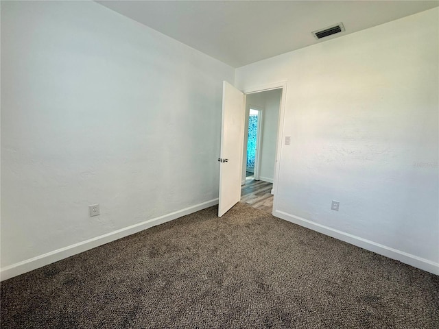 21899 Cellini Ave, Port Charlotte, FL 33952 - carpeted spare room with baseboards