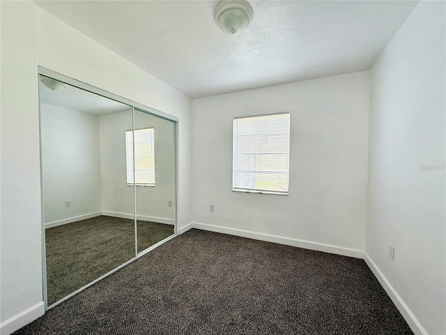 21899 Cellini Ave, Port Charlotte, FL 33952 - unfurnished bedroom featuring carpet floors and a closet