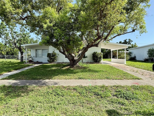 21899 Cellini Ave, Port Charlotte, FL 33952 - view of front of property featuring stucco siding