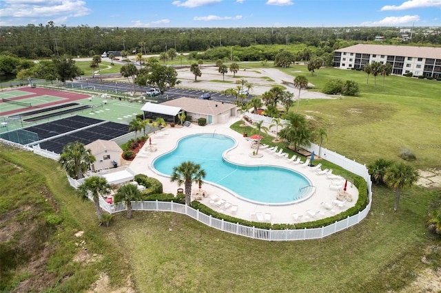 175 Kings Hwy Unit 625, Punta Gorda, FL 33983 - drone / aerial view of a pool and a tree filled landscape
