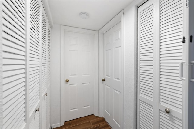 175 Kings Hwy Unit 625, Punta Gorda, FL 33983 - corridor featuring dark wood-style flooring