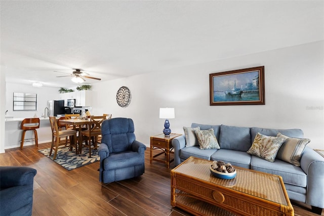 175 Kings Hwy Unit 625, Punta Gorda, FL 33983 - living area featuring dark wood finished floors, ceiling fan, and baseboards