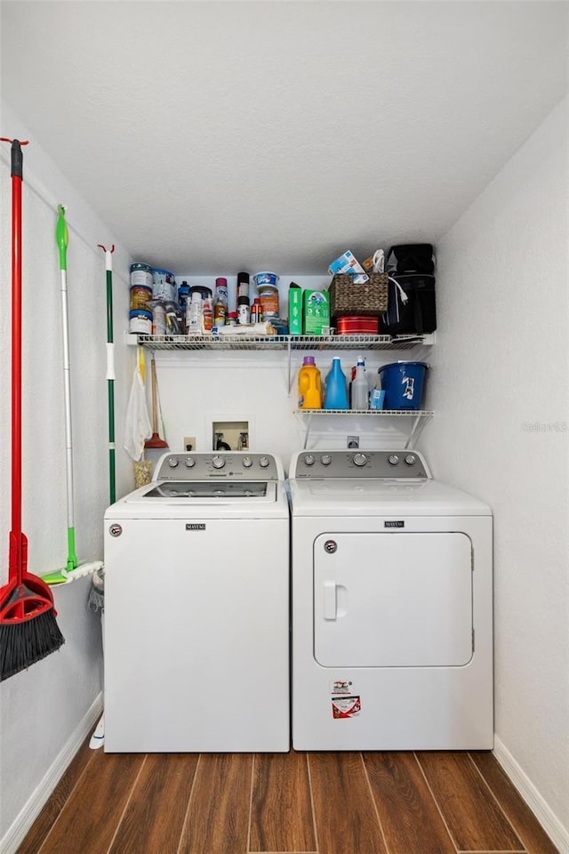 175 Kings Hwy Unit 625, Punta Gorda, FL 33983 - laundry area with separate washer and dryer, baseboards, and dark wood-style floors