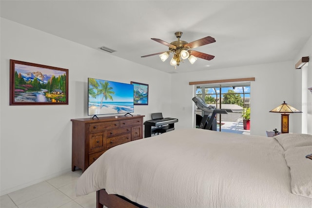 2223 SE 10th Ln, Cape Coral, FL 33990 - bedroom featuring access to exterior, light tile patterned flooring, ceiling fan, and baseboards