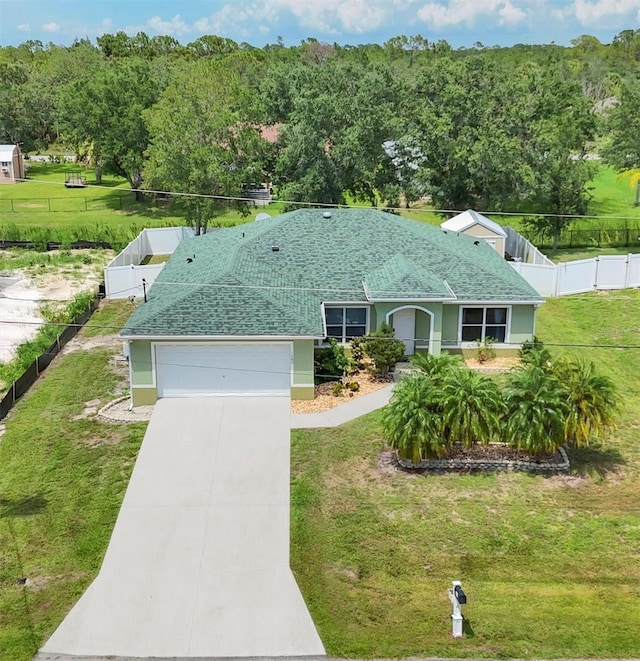 7280 Muncey Rd, North Port, FL 34291 - ranch-style home with an attached garage and driveway