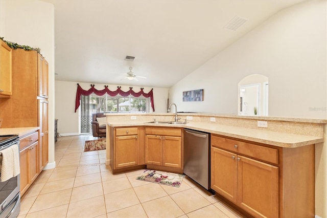 7280 Muncey Rd, North Port, FL 34291 - kitchen with stainless steel appliances, vaulted ceiling, a ceiling fan, light countertops, and light tile patterned flooring