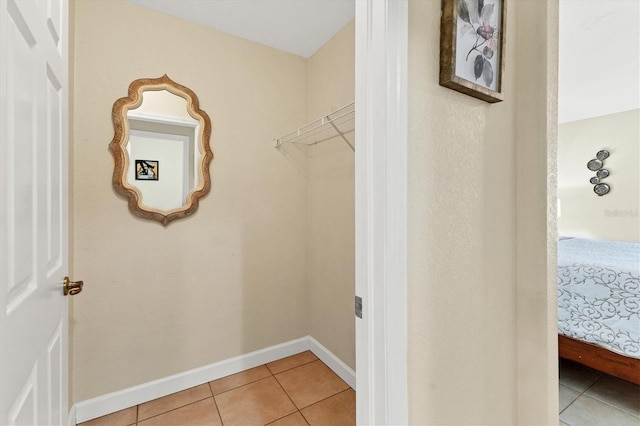 7280 Muncey Rd, North Port, FL 34291 - walk in closet featuring light tile patterned floors