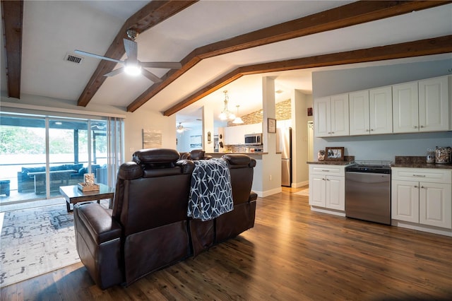 21220 Pemberton Ave, Port Charlotte, FL 33952 - living room featuring a ceiling fan, dark wood finished floors, a chandelier, and baseboards