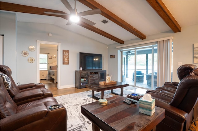 21220 Pemberton Ave, Port Charlotte, FL 33952 - living room with a ceiling fan, wood finished floors, and baseboards