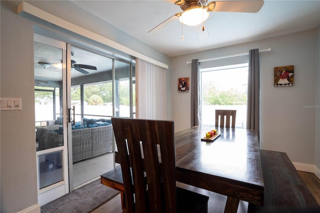 21220 Pemberton Ave, Port Charlotte, FL 33952 - dining area with ceiling fan and wood finished floors