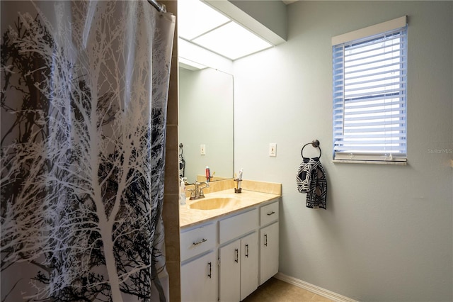 21220 Pemberton Ave, Port Charlotte, FL 33952 - bathroom with vanity, baseboards, and curtained shower