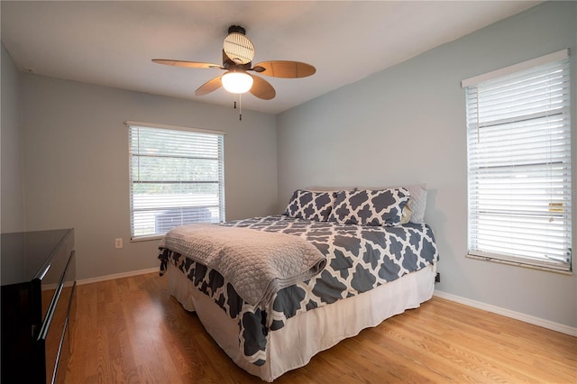 21220 Pemberton Ave, Port Charlotte, FL 33952 - bedroom featuring light wood-style flooring, baseboards, and ceiling fan