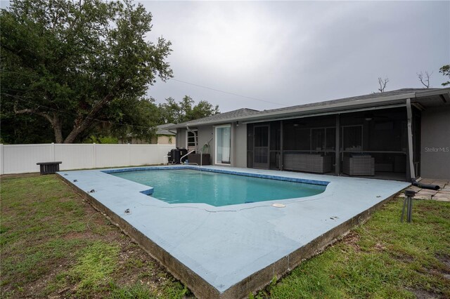 21220 Pemberton Ave, Port Charlotte, FL 33952 - view of pool featuring a sunroom and a patio area
