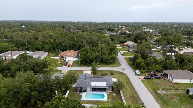 21220 Pemberton Ave, Port Charlotte, FL 33952 - aerial view of residential area featuring a forest and a pool